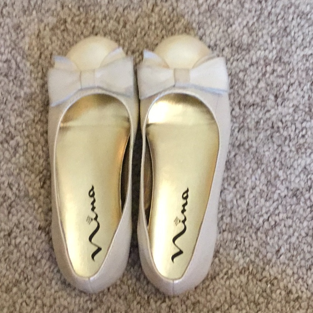 I am selling a cream leather flats.